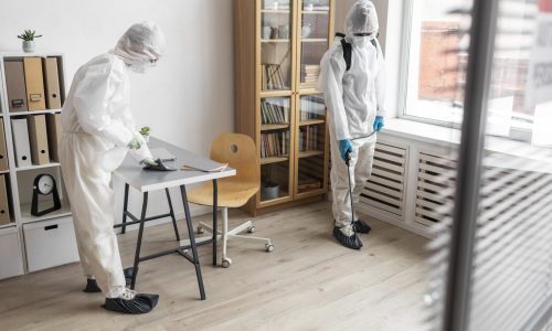 people-wearing-protective-equipment-disinfecting-dangerous-area